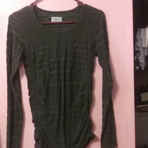A tight green shirt